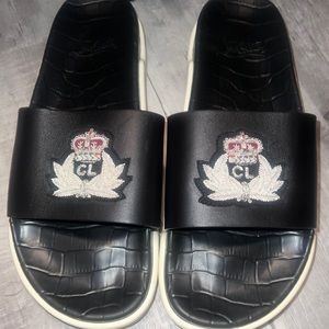 Authentic Christian Louboutin slides. Leather top, Runner soles